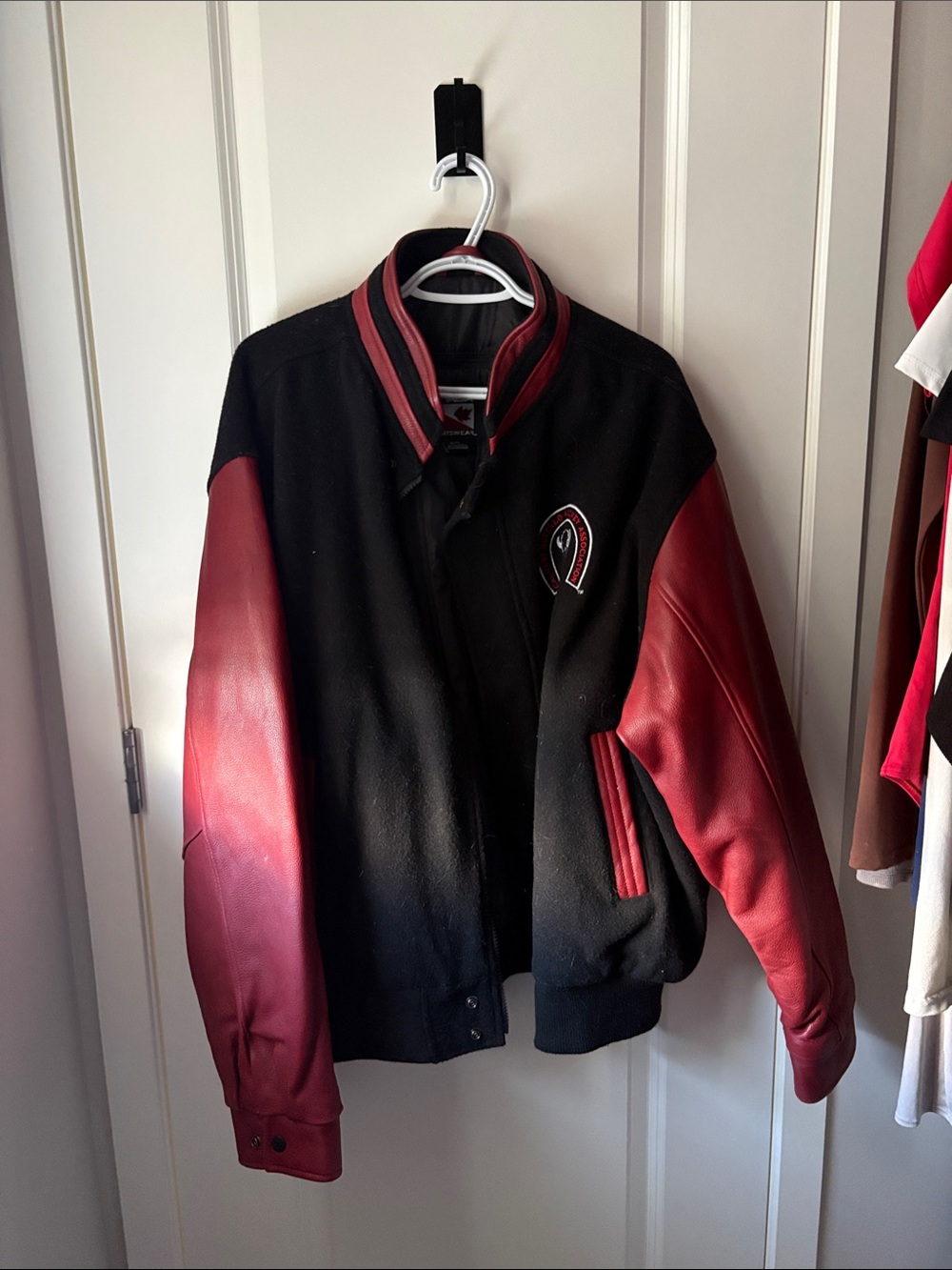 Canadiana Sportswear Black Jacket with Red Logo Label